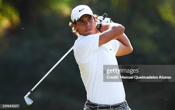 Rafael Nadal of Spain plays a shot during the pro - am prior to the start of the Castello Masters Costa Azahar at the Club de Campo del Mediterraneo...