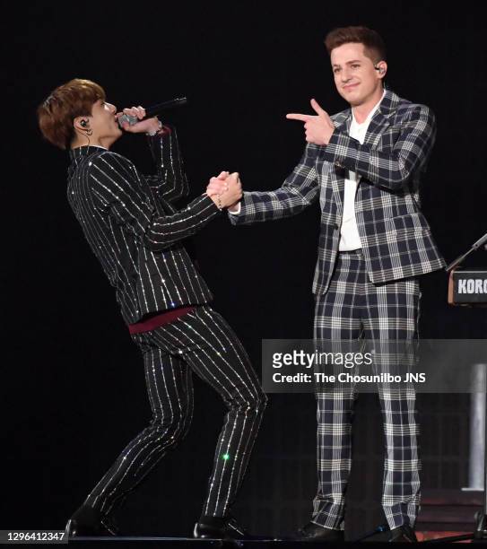Jungkook of BTS and Charlie Puth perform at the 2018 MBC Plus X Genie Music Awards at Namdong Gymnasium on November 06, 2018 in Incheon, South Korea.