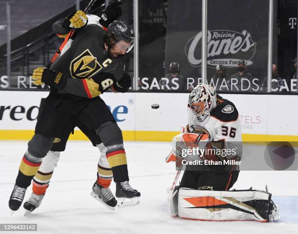 John Gibson of the Anaheim Ducks blocks a shot in front of Mark Stone of the Vegas Golden Knights in the second period of their game at T-Mobile...