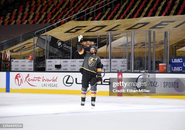 Mark Stone of the Vegas Golden Knights waves to an empty arena after being named the first star of the game following the team's 5-2 victory over the...