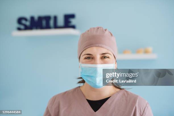 if you're not smiling, i'll make sure you will - nurse headshot stock pictures, royalty-free photos & images