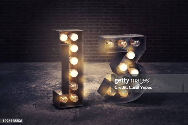 number 13 y metallic light bulb.retro style - number 13 stock pictures, royalty-free photos & images