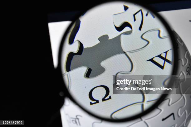 In this photo illustration,The logo of Wikipedia is seen on the screen of a laptop with a magnifying glass on January 15, 2021 in Ankara, Turkey.