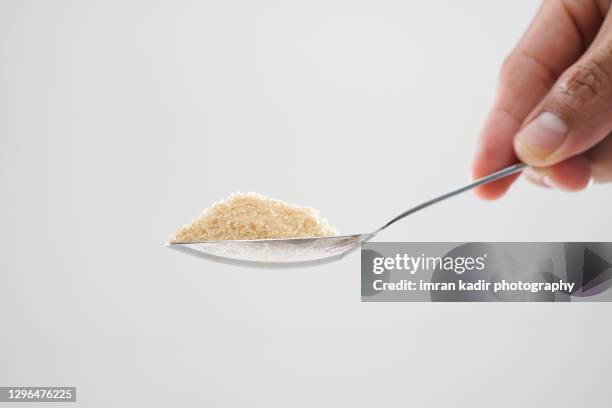 cropped one tablespoon of sugar - colher de sopa imagens e fotografias de stock