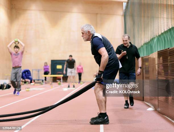 Battle Ropes In Use Battle Ropes Senior Photos and Premium High Res Pictures - Getty Images
