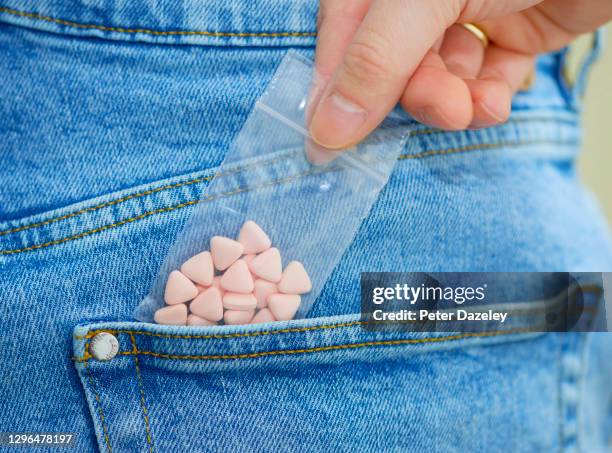 university student with party drugs - mdma stock pictures, royalty-free photos & images