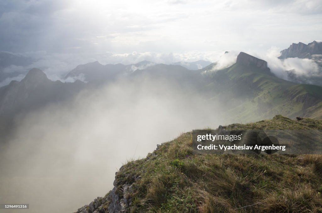 Panoramic view of Tkhach mountains in clouds, Caucasus