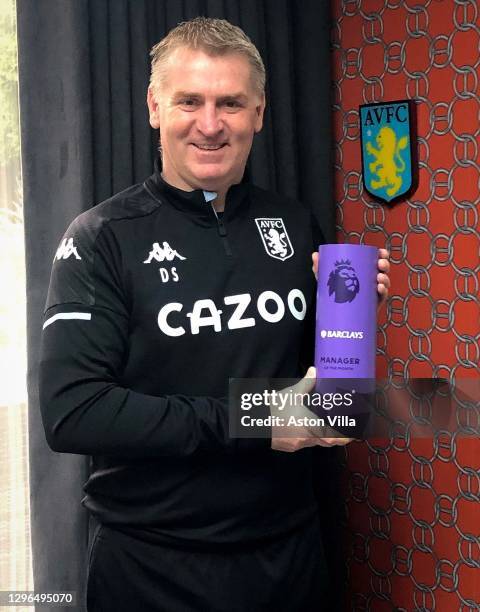 Dean Smith of Aston Villa poses with his Premier League Manager of the Month Award for December 2020 on January 15, 2021 in Birmingham, England.