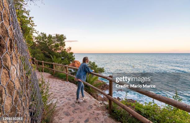 blonde girl on her way to round - cataluña stock pictures, royalty-free photos & images