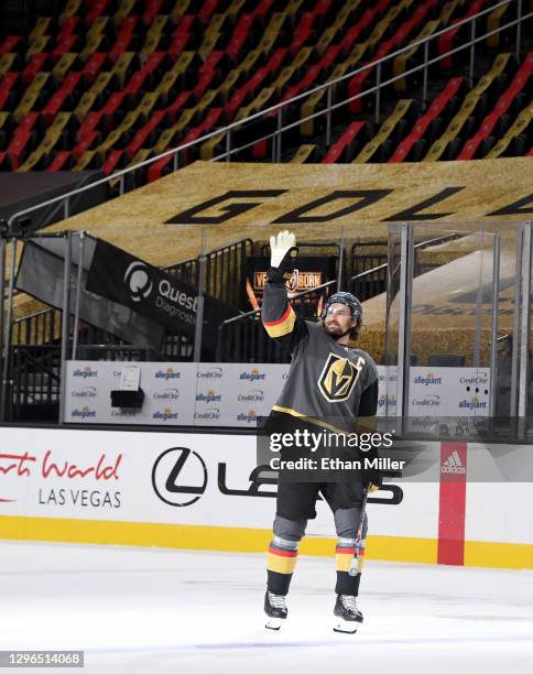 Mark Stone of the Vegas Golden Knights waves to an empty arena after being named the first star of the game following the team's 5-2 victory over the...