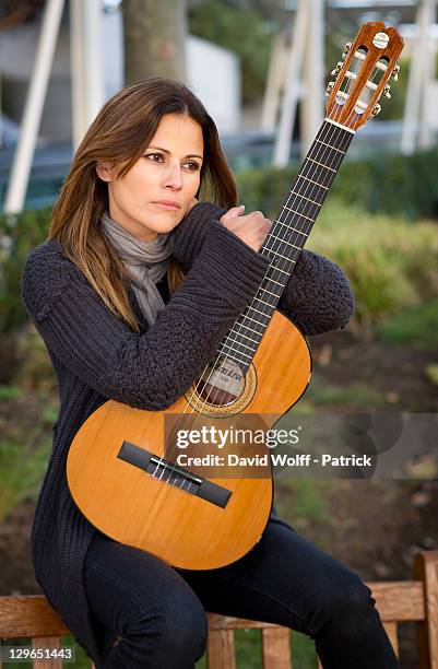 Cecile Simeone poses for Photo session at Porte de Versailles on October 19, 2011 in Paris, France.