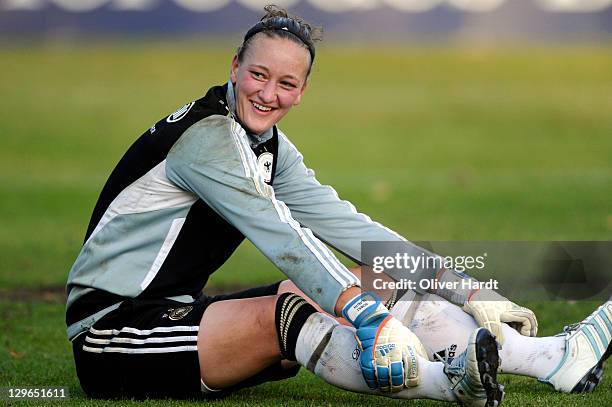 Almuth Schult smiles during the Germany women's training session on October 19, 2011 in Hamburg, Germany.