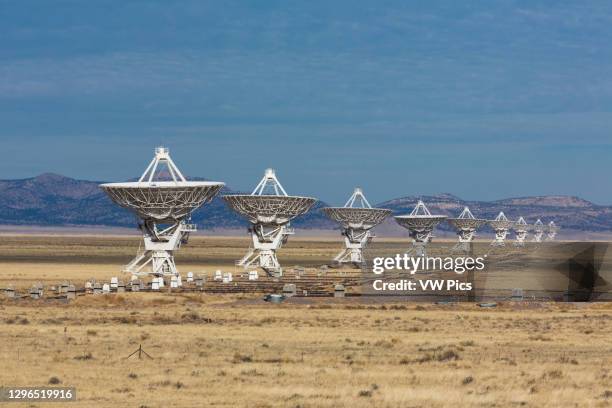 Antenna dishes of the Karl G. Jansky Very Large Array radiotelescope astronomy observatory near Magdalena, New Mexico in the United States. The Very...