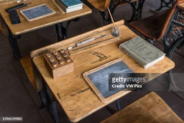 Vintage school desks and memorabilia donated to the Henry schoolhouse museum in Wayan, Idaho..