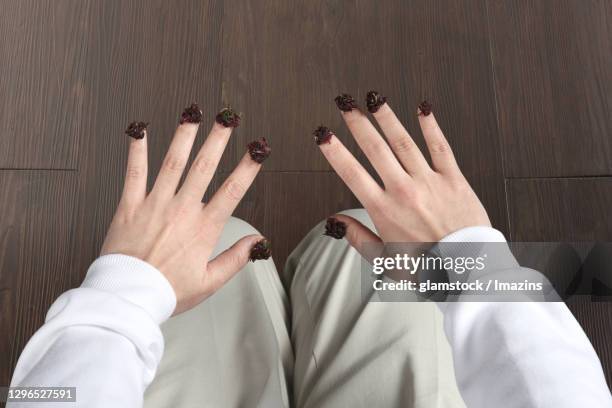 hand, child, children's hand, balsam, dyeing, top angle - färbemittel stock-fotos und bilder