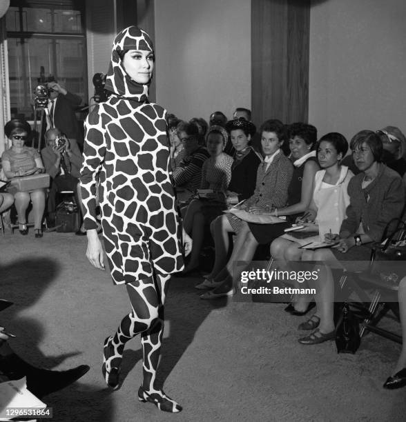 Designer Rudi Gernreich, creator of the topless bathing suit, put the "total look" into action during his 1966 Fall Collection showing to buyers and...