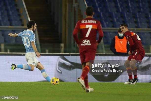 Luis Alberto of Lazio scores his team's third goal during the Serie A match between SS Lazio and AS Roma at Stadio Olimpico on January 15, 2021 in...