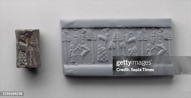 Cylinder seal and modern impression: hunting scene, Akkadian, ca. 2250–2150 B.C, Mesopotamia, Akkadian, Chert, H. 1 1/8 in. , Stone-Cylinder...