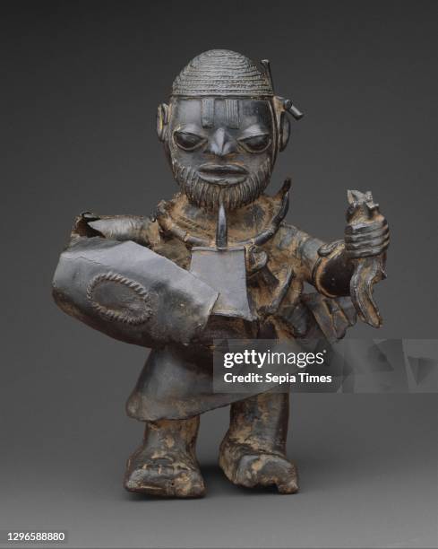 Male Warrior, 1455–1640, Nigeria, Lower Niger River region, Lower Niger Bronze Industry, Brass, clay, teeth, glass beads , H. 12 3/4 in. ,...