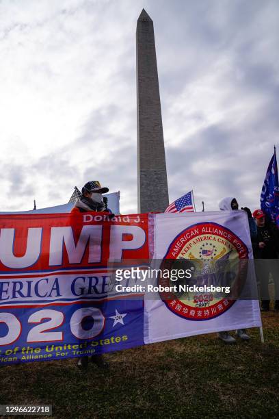 Crowds from the pro-Trump Chinese American Alliance For Trump gather for the "Stop the Steal" rally on January 06, 2021 in Washington, DC. Trump...