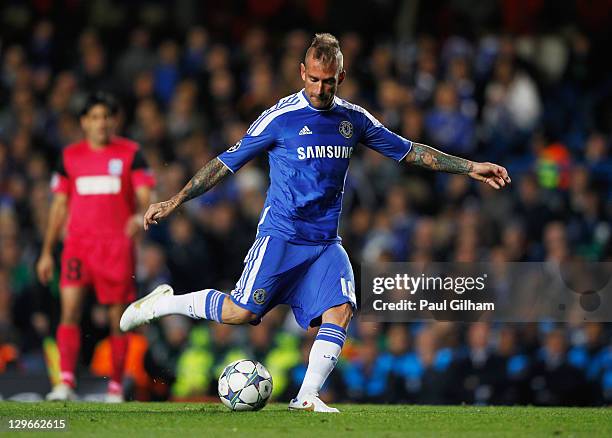 Raul Meireles of Chelsea scores their first goal during the UEFA Champions League group E match between Chelsea and Genk at Stamford Bridge on...