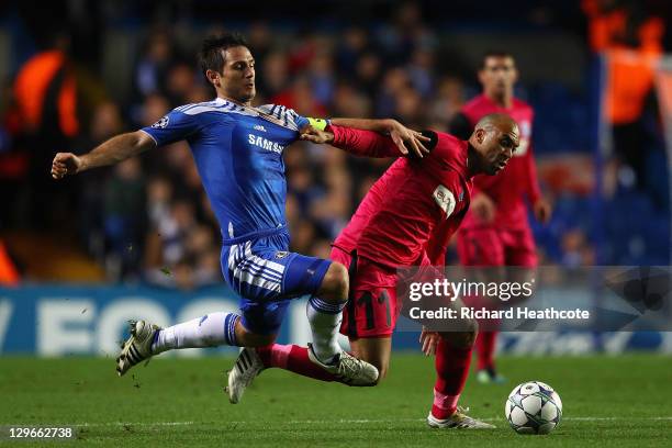Frank Lampard of Chelsea and Anthony Vanden Borre of KRC Genk battle for the ball during the UEFA Champions League Group E match between Chelsea and...