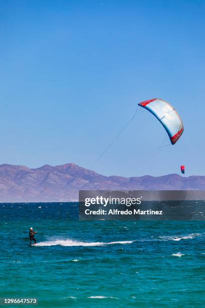 Kitesurfer enjoys the wind in the Gulf of California during a day amid Covid-19 pandemic at Playa La Ventana on January 15, 2021 in La Paz, Mexico....