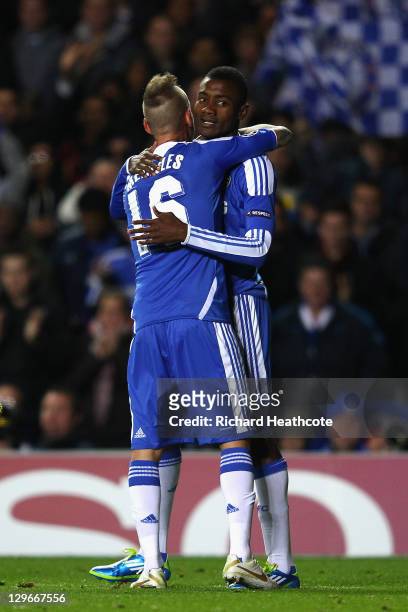 Salomon Kalou of Chelsea celebrates with team mate Raul Meireles after scoring his side's fifth goal during the UEFA Champions League Group E match...