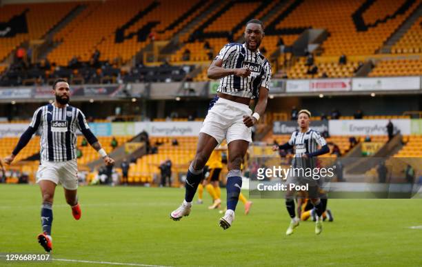 Semi Ajayi of West Bromwich Albion celebrates after scoring his team's second goal during the Premier League match between Wolverhampton Wanderers...
