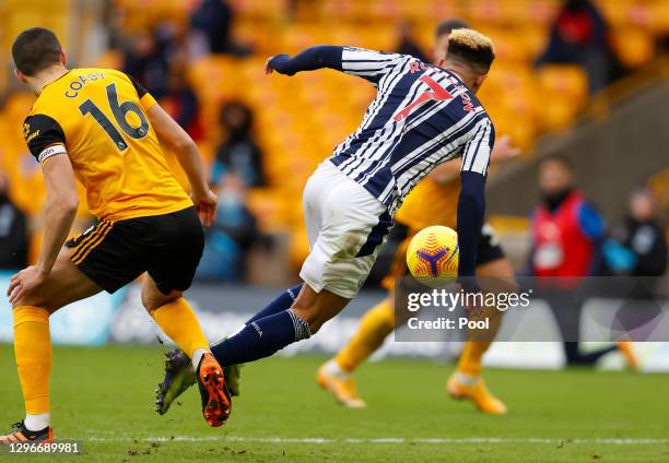 Callum Robinson of West Bromwich Albion is fouled by Conor Coady of Wolverhampton Wanderers inside the penalty area leading to a West Bromwich Albion...