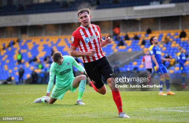 Charlie Wyke of Sunderland celebrates scoring the 3rd goal during the Sky Bet League One match between AFC Wimbledon and Sunderland at Plough Lane on...