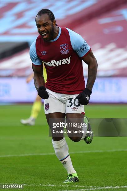 Michail Antonio of West Ham United celebrates after scoring his team's first goal during the Premier League match between West Ham United and Burnley...