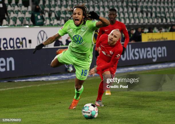 Kevin Mbabu of VfL Wolfsburg is challenged by Angelino of RB Leipzig during the Bundesliga match between VfL Wolfsburg and RB Leipzig at Volkswagen...