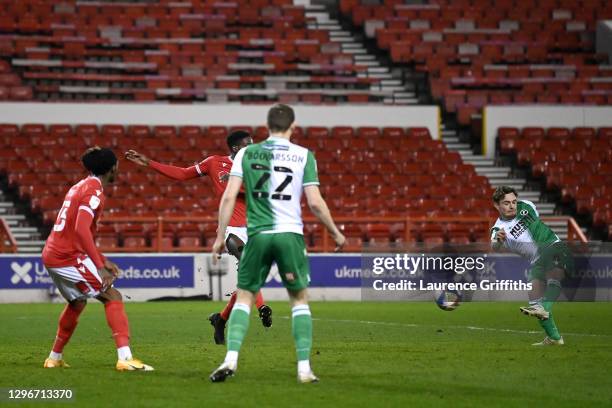 Ben Thompson of Millwall scores his team's first goal during the Sky Bet Championship match between Nottingham Forest and Middlesbrough at City...