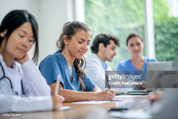medical student residents in training - civilian stock pictures, royalty-free photos & images