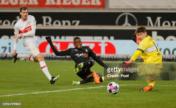 Denis Zakaria of Borussia Moenchengladbach scores their side's second goal past Gregor Kobel of VfB Stuttgart during the Bundesliga match between VfB...
