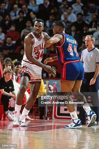 Charles Oakley of the Chicago Bulls defends against Rick Mahorn of the Detroit Pistons circa 1987 at Chicago Stadium in Chicago, Illinois . NOTE TO...