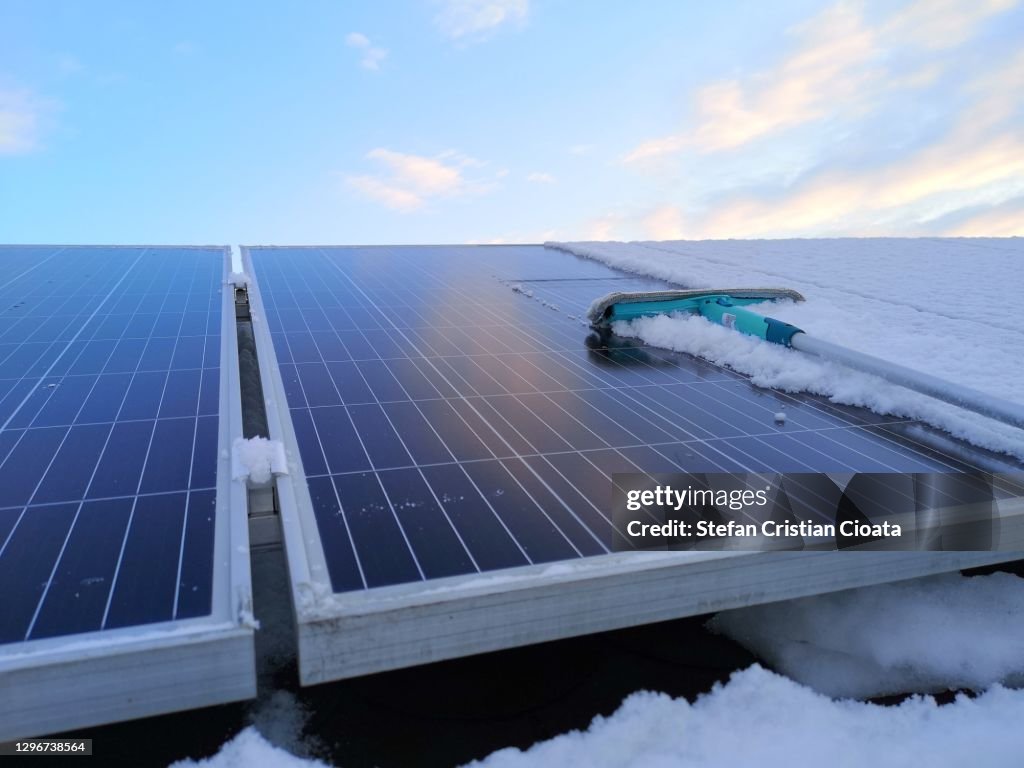 Solar panels covered with snow