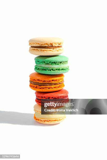 macaroons in different colours as the gift on valentine's day. - macaroon stock pictures, royalty-free photos & images