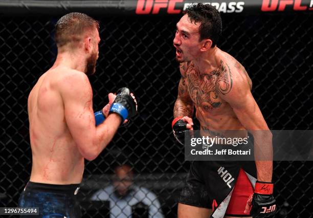 Max Holloway taunts Calvin Kattar in a featherweight bout during the UFC Fight Night event at Etihad Arena on UFC Fight Island on January 17, 2021 in...