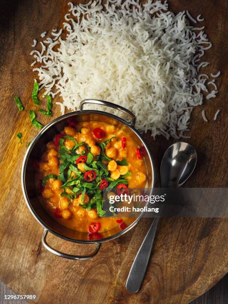 healthy vegan chickpea spinach korma - curry stock pictures, royalty-free photos & images