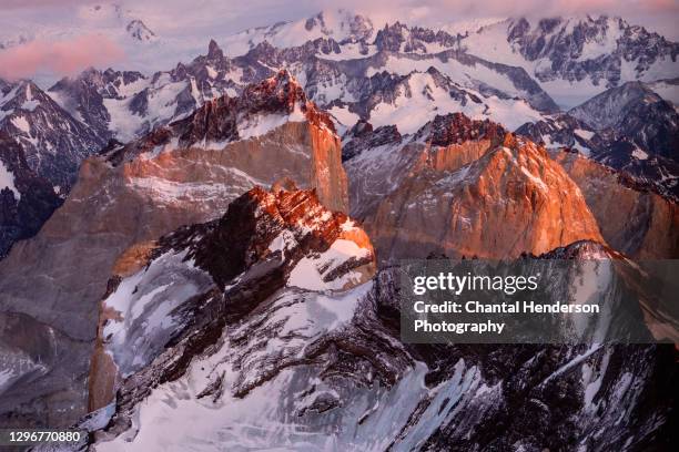 sunrise over the horns of torres del paine - chile australia stock pictures, royalty-free photos & images