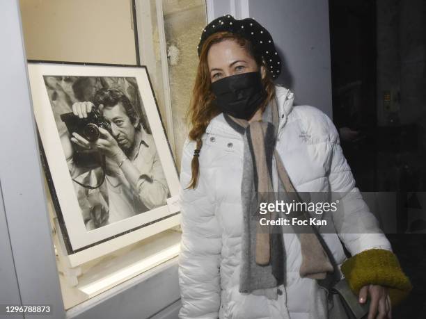 Actress Myriam Charleins poses with Serge Gainsbourg by photographer Pierre Terrasson during "Colors" Exhibition Preview and Concert of Elle at...