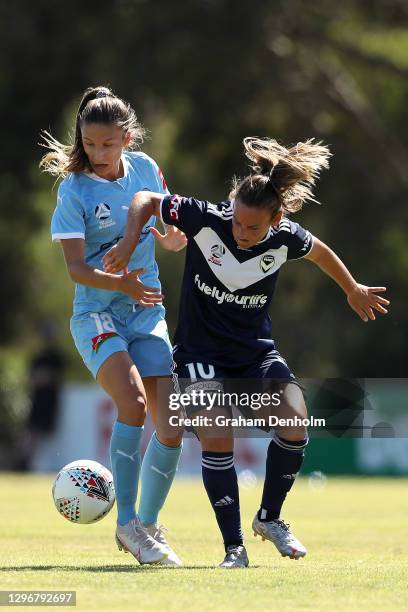 Annalie Longo of the Victory and Leah Davidson of Melbourne City compete for the ball during the round four W-League match between the Melbourne...
