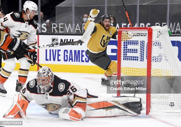 Mark Stone of the Vegas Golden Knights celebrates after he passed to Max Pacioretty who beat John Gibson of the Anaheim Ducks with a shot in overtime...