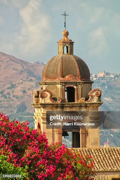 a church tower among bugenvilleas - taormina stock pictures, royalty-free photos & images