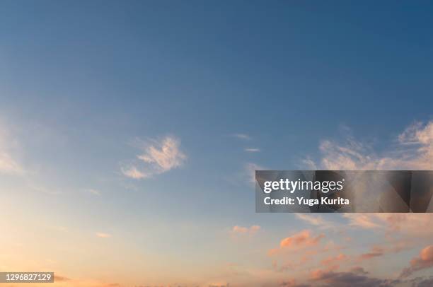 orange clouds at sunset - soft fluffy stock pictures, royalty-free photos & images