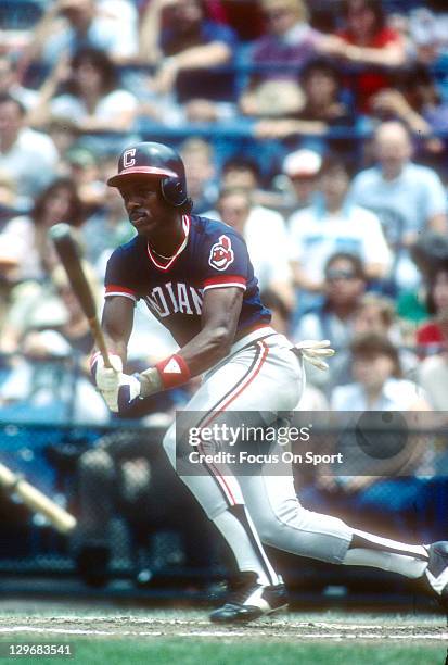 Julio Franco of the Cleveland Indians bats against the Baltimore Orioles during an Major League Baseball game circa 1984 at Memorial Stadium in...