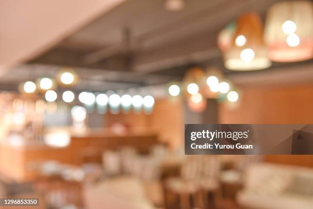 defocus effect of the coffee room. coffee room in the library, jiangmen, guangdong, china. - kitchen background stock-fotos und bilder