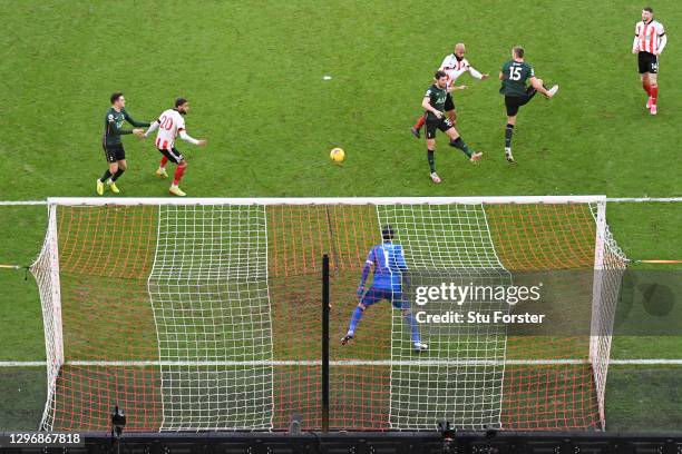 David McGoldrick of Sheffield United scores their sides first goal past Hugo Lloris of Tottenham Hotspur during the Premier League match between...